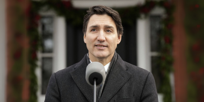 Canada Prime Minister Justin Trudeau makes an announcement outside Rideau Cottage in Ottawa, Canada, on January 6. Adrian Wyld/The Canadian Press/AP